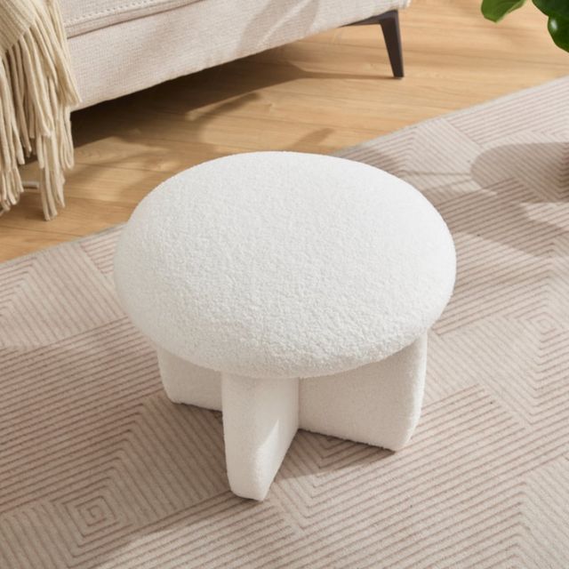 white upholstered Ottoman