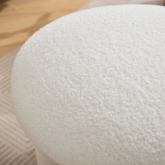 white upholstered Ottoman